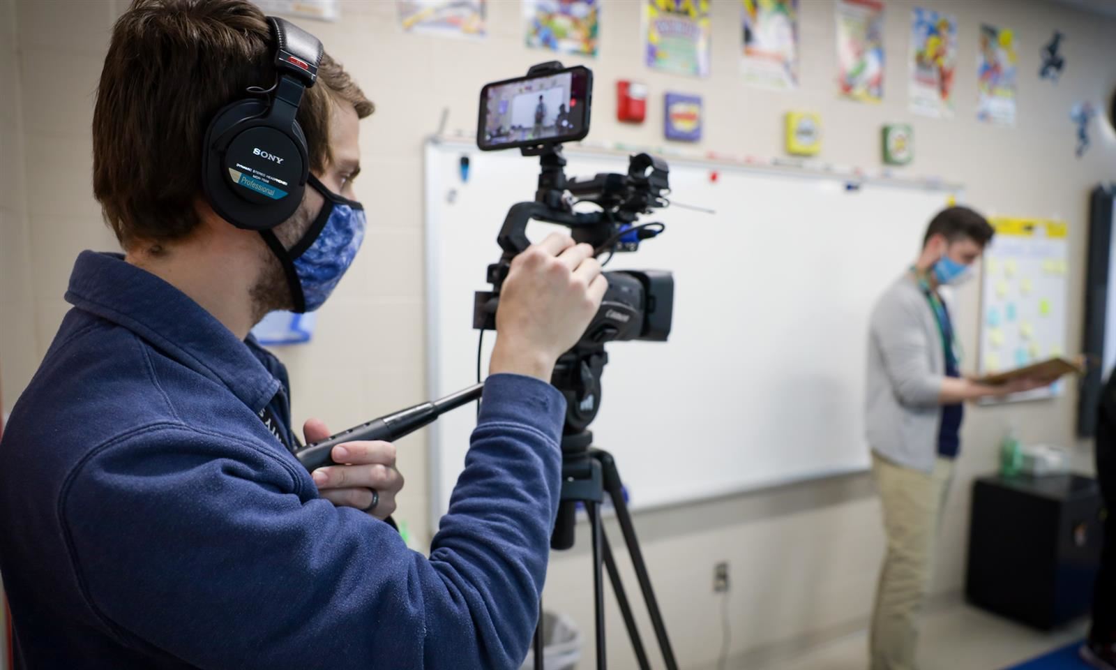 Person films teacher 
